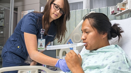 A patient is observed by a health care provider.