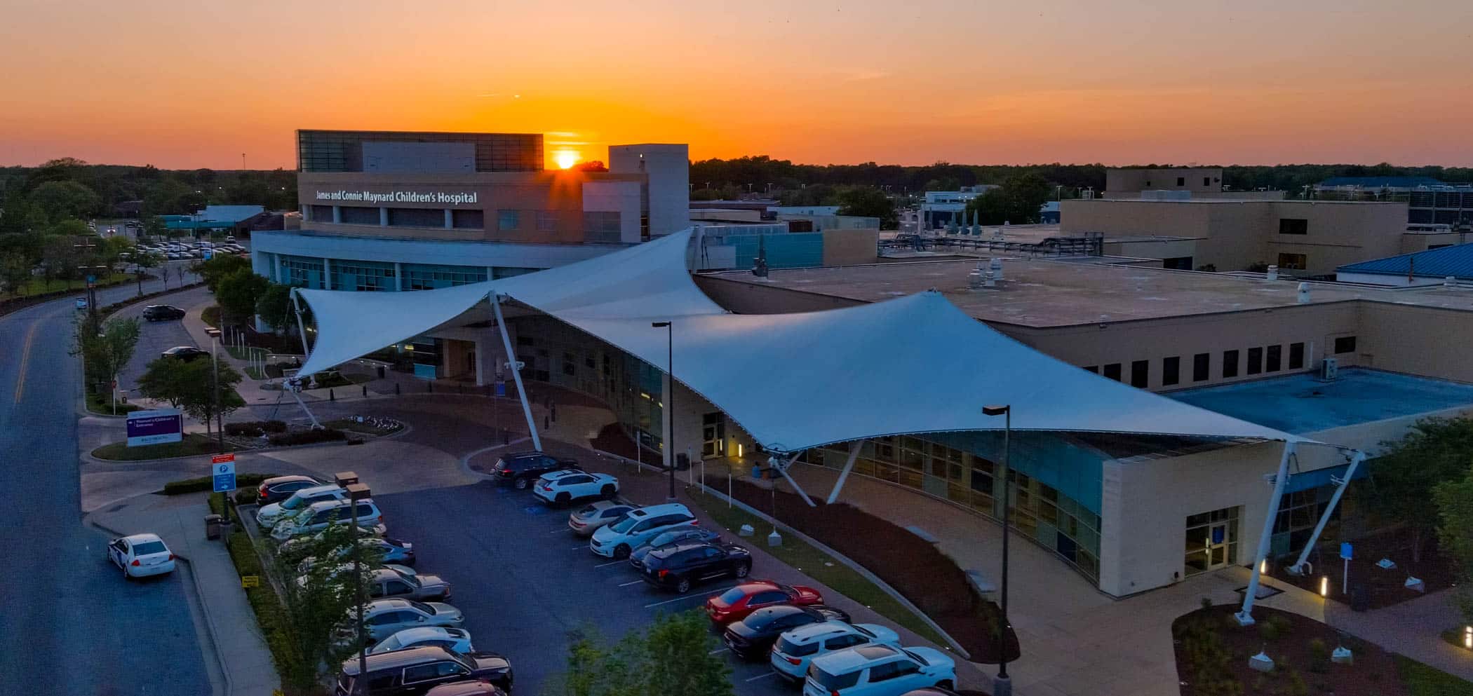 Maynard Children's Hospital at ECU Health Medical Center is shown at sunset.