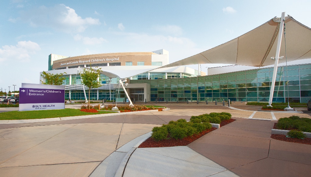 The exterior of Maynard Children's Hospital at ECU Health Medical Center is shown on a bright summer day.