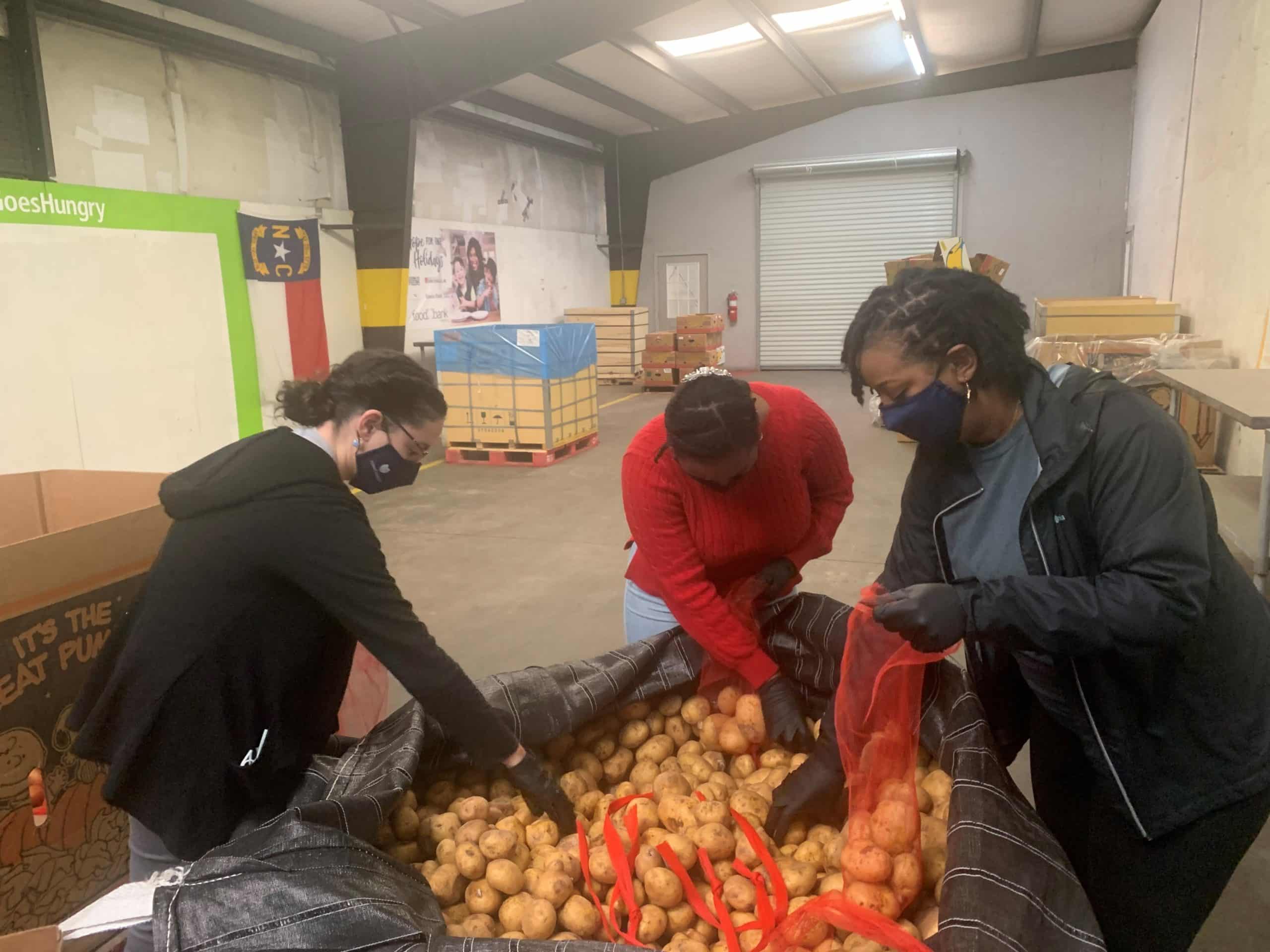 Vidant team members volunteer at a local food bank