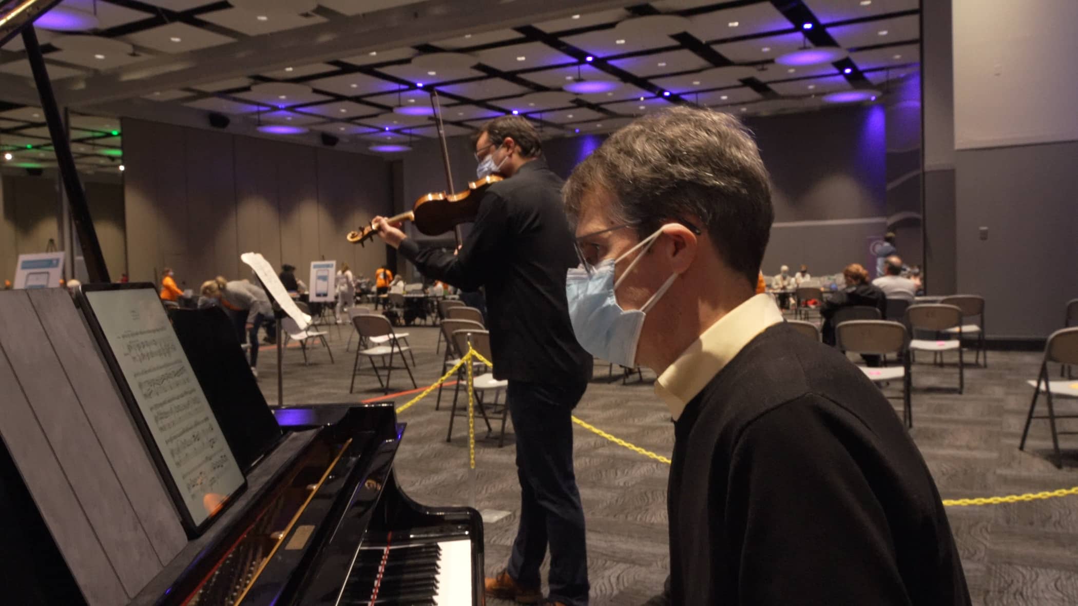 Musicians play at the Vidant/Pitt Large-Scale Vaccine Clinic at the Greenville Convention Center.