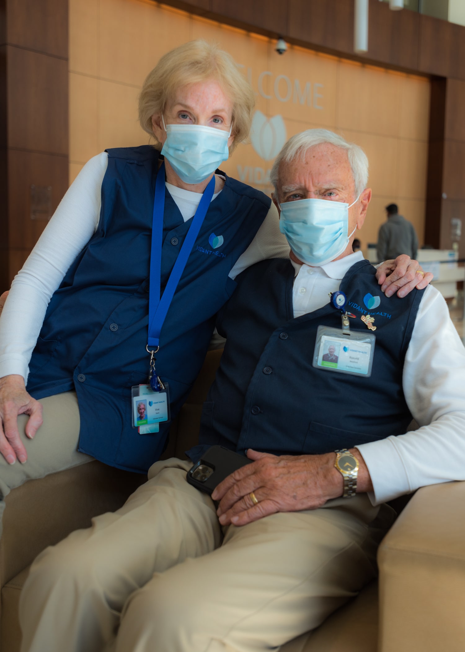 Volunteers Vivie and Ron Baseford sit together at ECU Health Medical Center