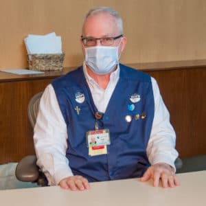 VMC volunteer Terry King poses for a photo.