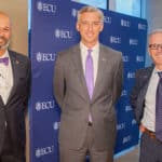 ECU Health Chief Health Officer Dr. Jason Higginson poses for a photo with ECU Chancellor Philip Rogers and ECU Health CEO Dr. Michael Waldrum.