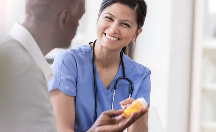 Diabetes-BP_IMG A provider discusses a prescription with a patient.