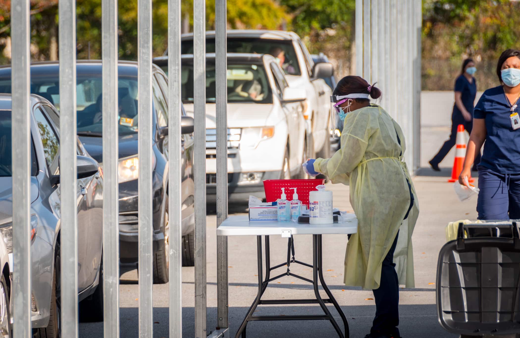 A team member administers COVID-19 tests.