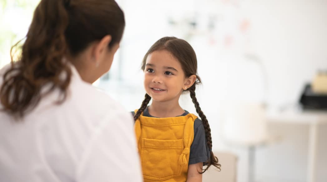 A student visits with a care provider.