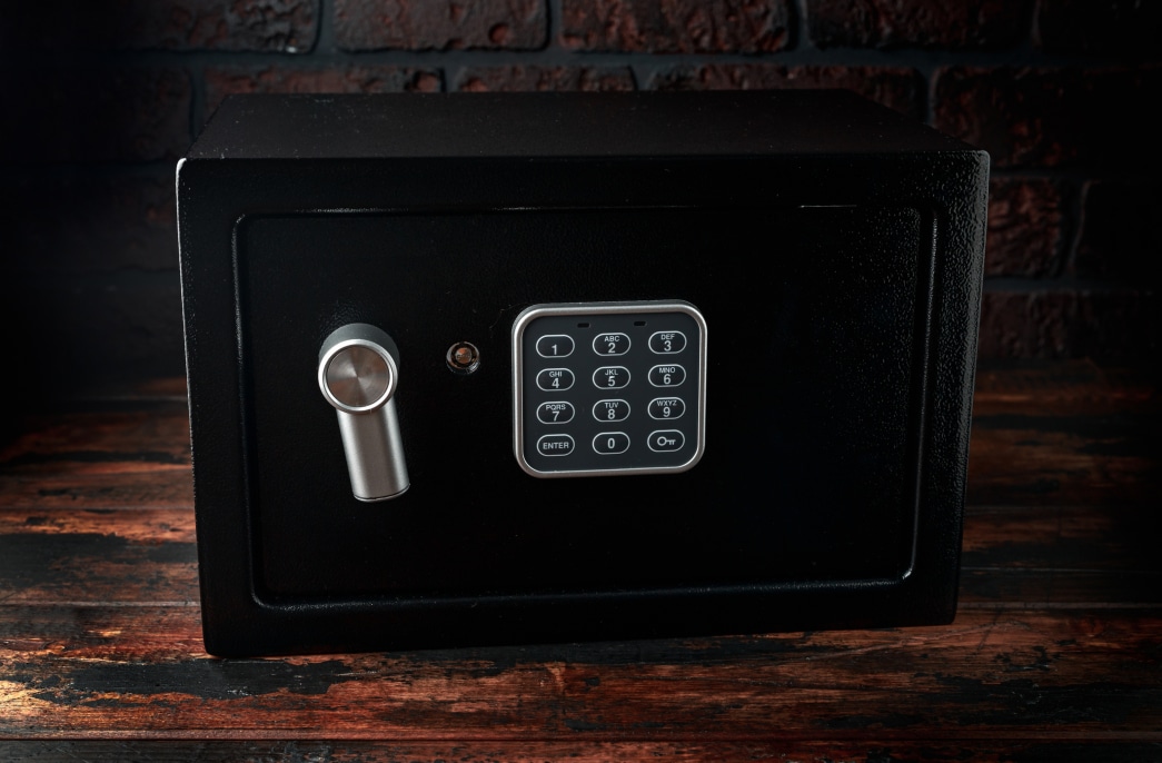 A safe is shown on a counter.