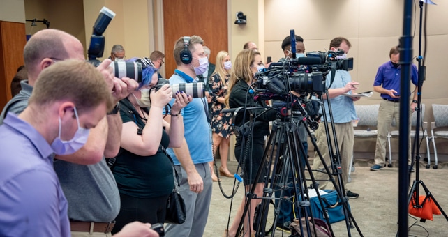news-pr Media members gather during an ECU Health press conference.