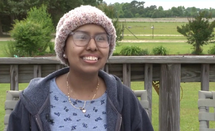 A Children's Miracle Network child talks to the media at home.