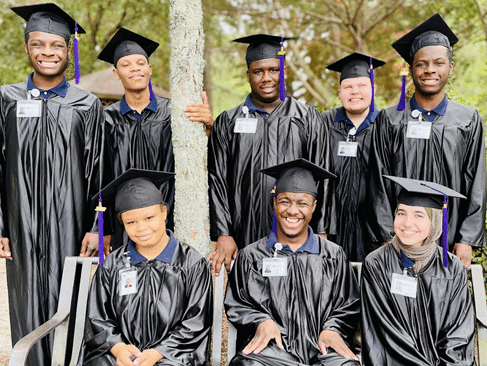 Project SEARCH students get together for a photo during their graduation ceremony.