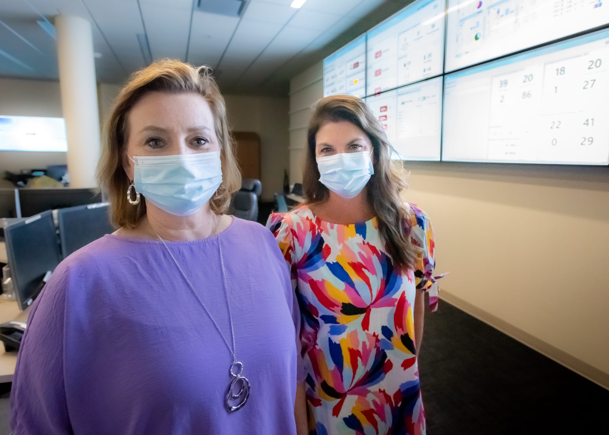 ECU Health team members Melanie Porter and DeAnna Edwards pose for a photo.