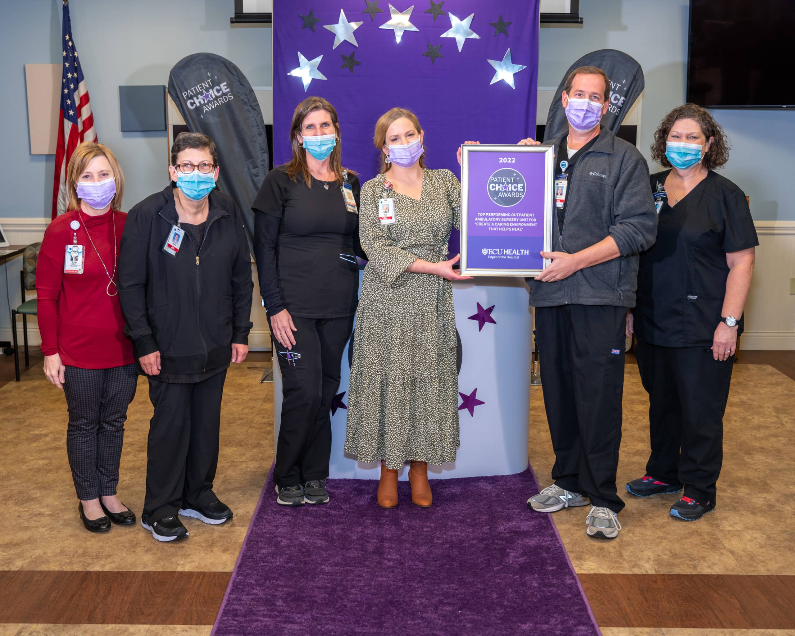 11_TopPerf-AmbulSurgery-Edgecombe_0410 The ECU Health Edgecombe Hospital – Ambulatory Surgery Unit team poses for a photo after earning the Patient Choice Award for Top Performing Ambulatory Surgery Unit for Creating a Caring Environment that Helps Heal.