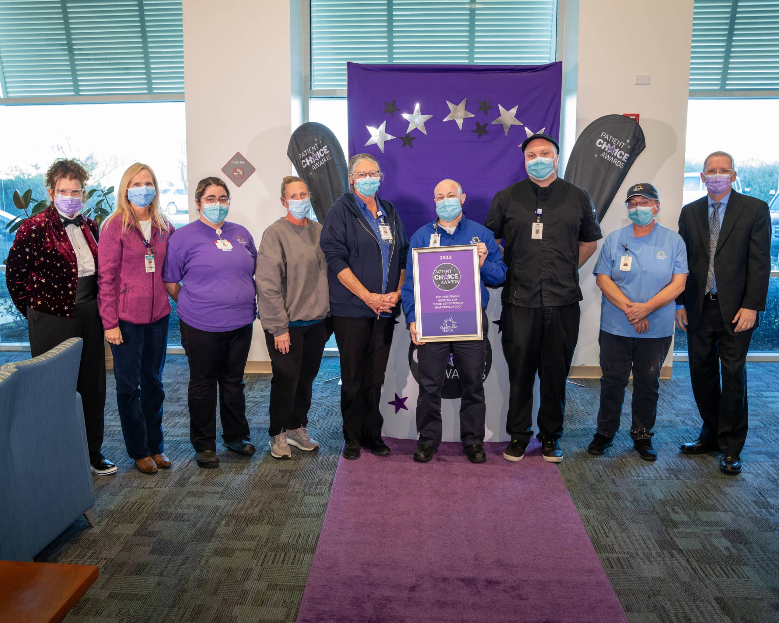 The Outer Banks Health Hospital team poses for a photo after earning the Patient Choice Award for Top Performing Hospital for Courtesy of a Person Who Served Food.