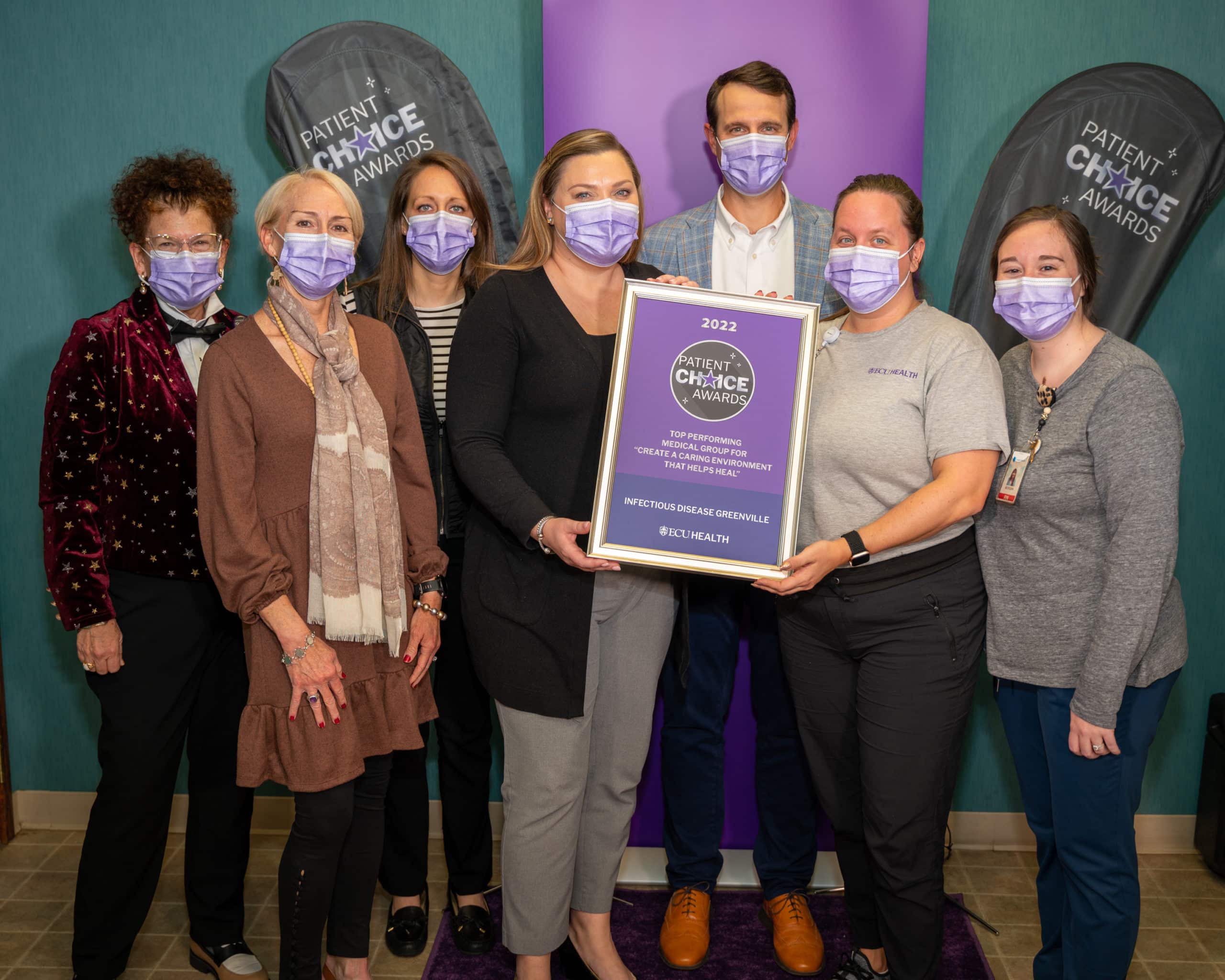 The ECU Health Infectious Disease – Greenville poses for a photo after winning the Patient Choice Award for Top Performing Medical Group for Creating a Caring Environment that Helps Heal.