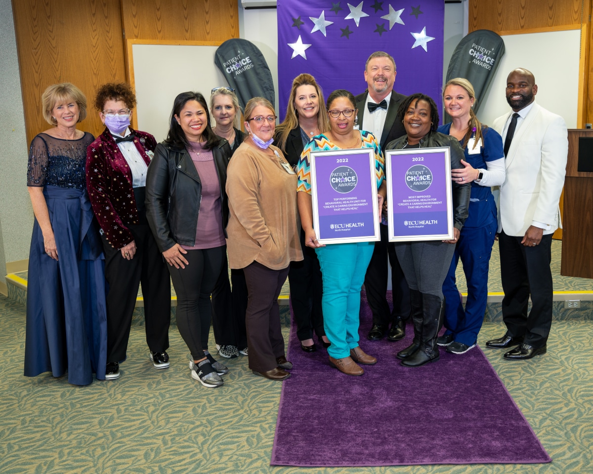 7_MostImpv-BehavHealth-North_0540 The ECU Health North Hospital team poses for a photo with their two Patient Choice Awards.
