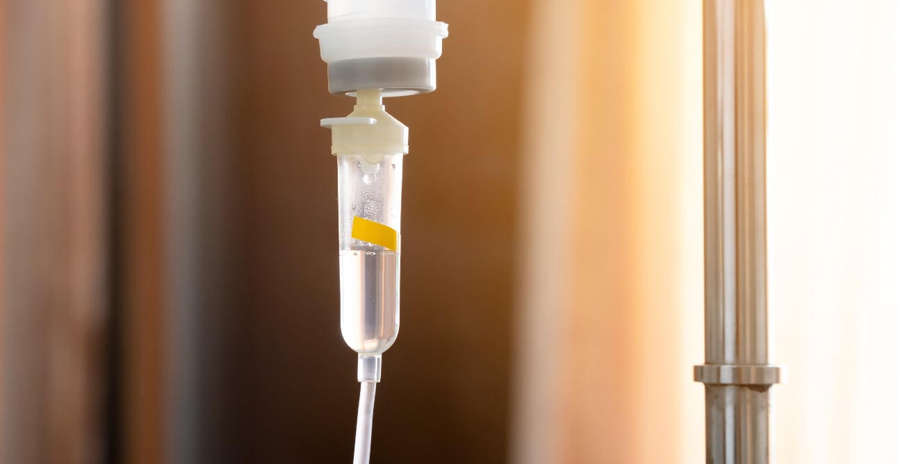 A close-up of an infusion drip in a patient's home.