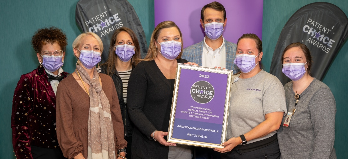 The ECU Health Infectious Disease – Greenville team poses for a photo with their Patient Choice Award.