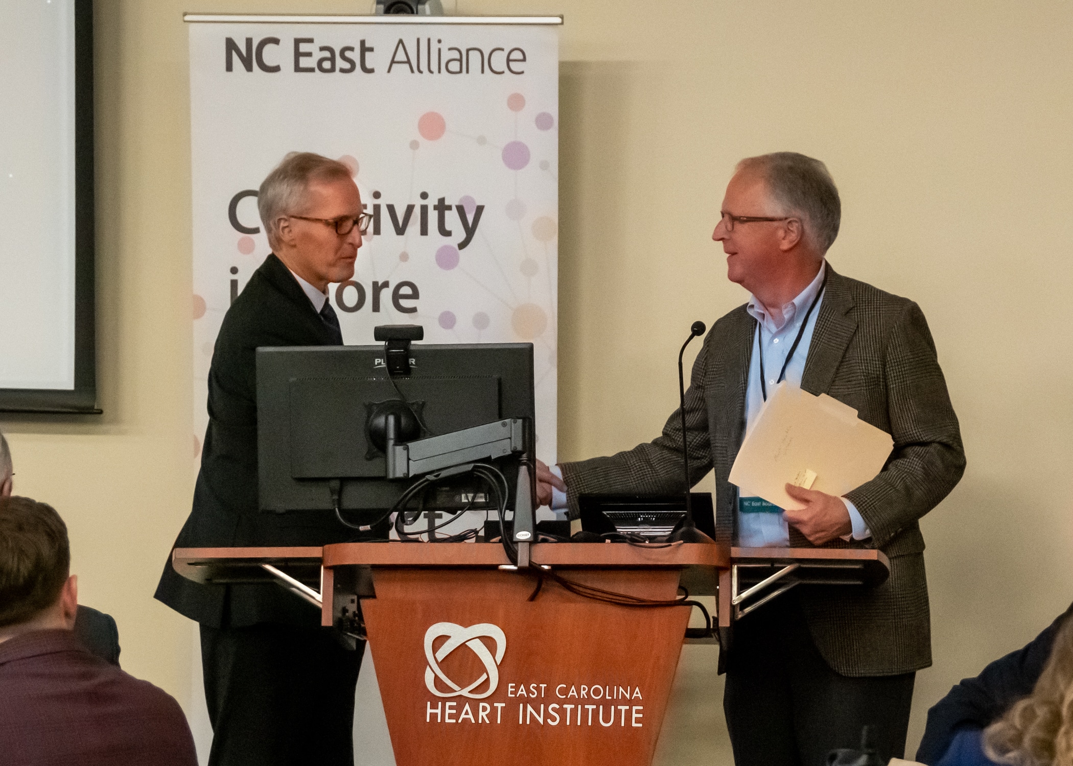 ECU Health CEO Dr. Michael Waldrum prepares to speak during the Vision 2023 event hosted by NC East Alliance.