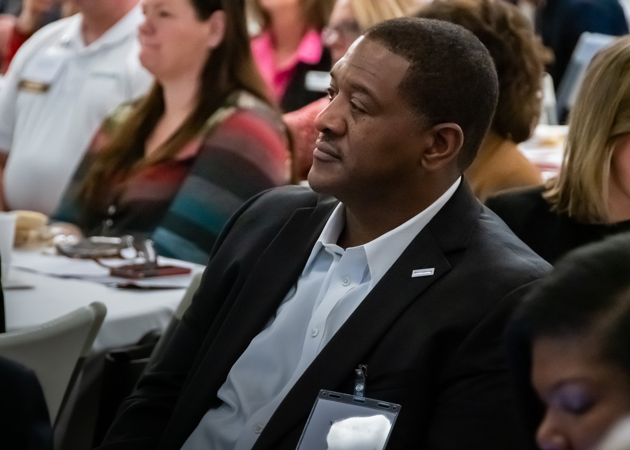 Mark Dunn listens to a presenter during the Vision 2023 event hosted by NC East Alliance.