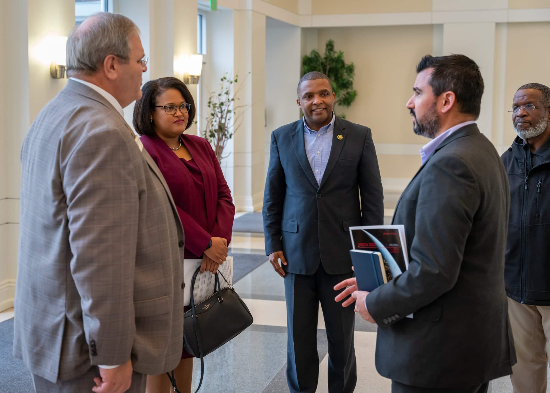 A group gathers to talk during the Vision 2023 event hosted by NC East Alliance.