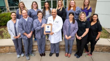 ECU Health Medical Center Echocardiography Laboratory team poses for a photo with their certificate.