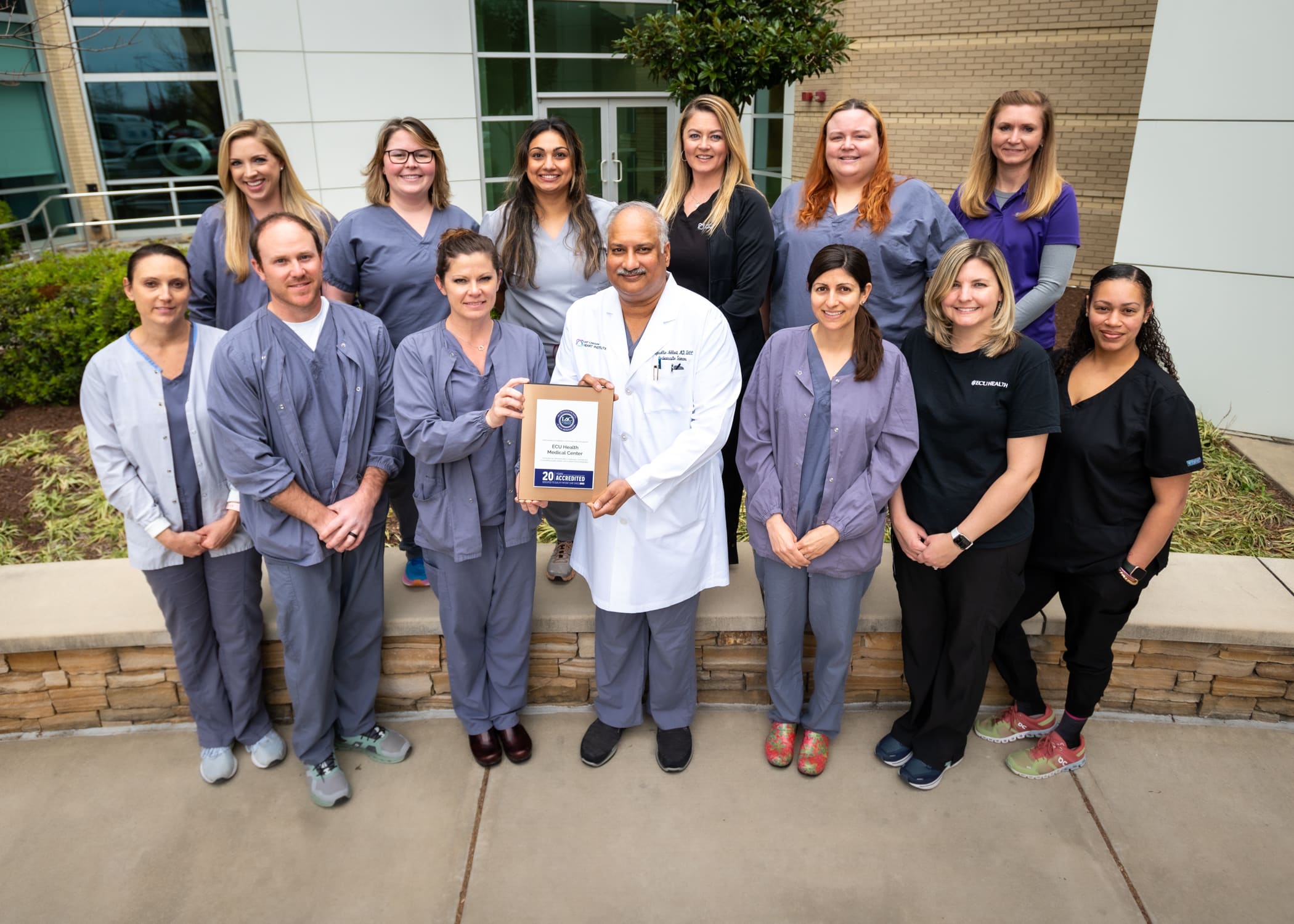 ECU Health Medical Center Echocardiography Laboratory team poses for a photo with their certificate.