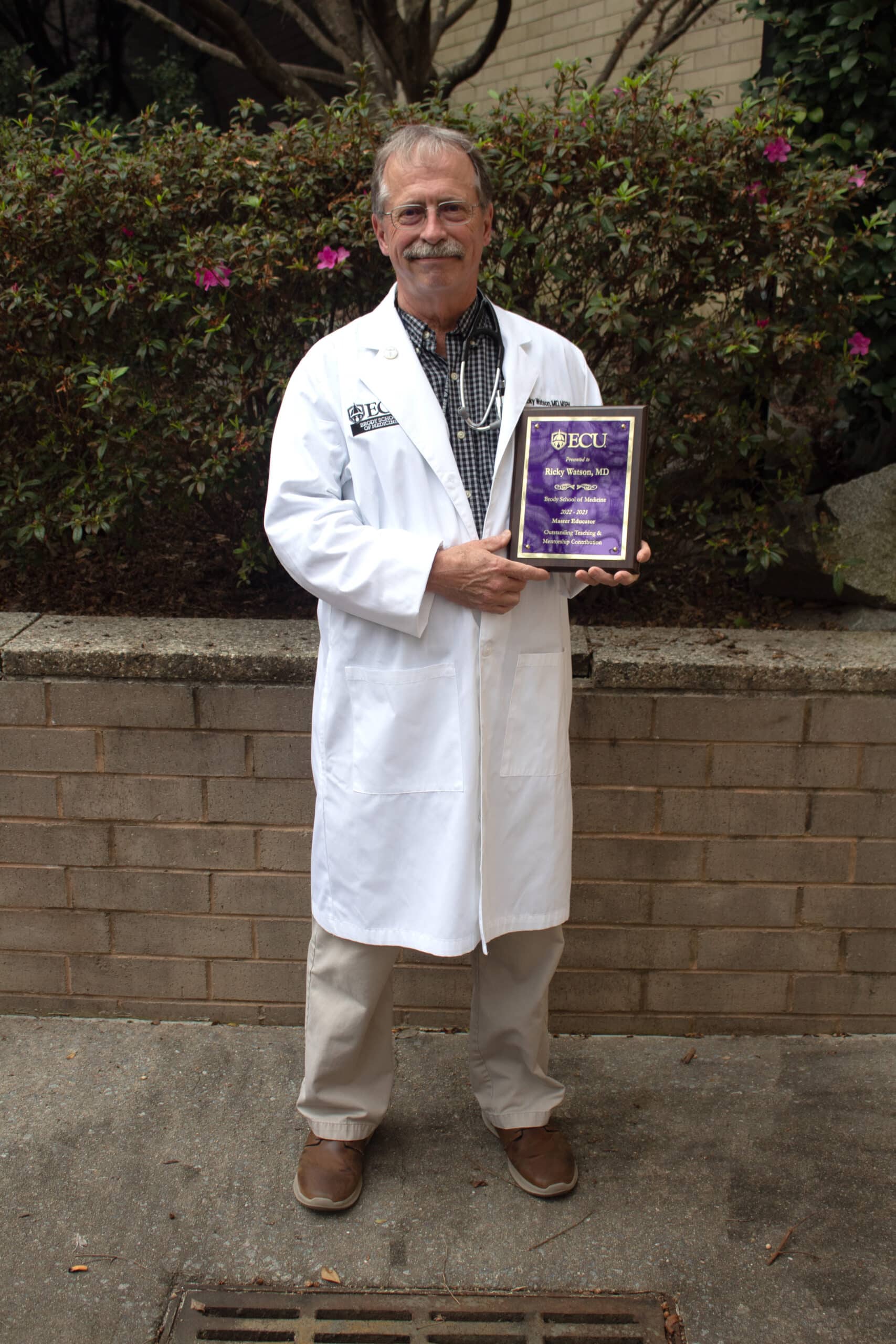 Dr. Ricky Watson poses for a photo after he was recently named a master educator by the Brody School of Medicine at East Carolina University.