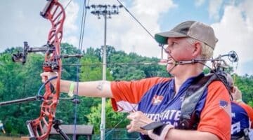 Wendy Gardner competes in an archery event.