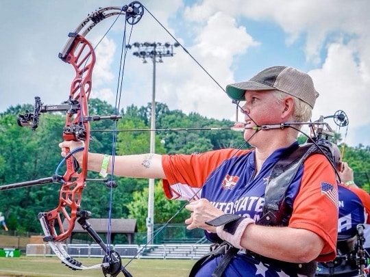 Wendy Gardner competes in an archery event.