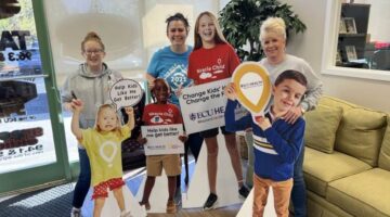 The team gathers for a photo during the Children's Miracle Network Radiothon.