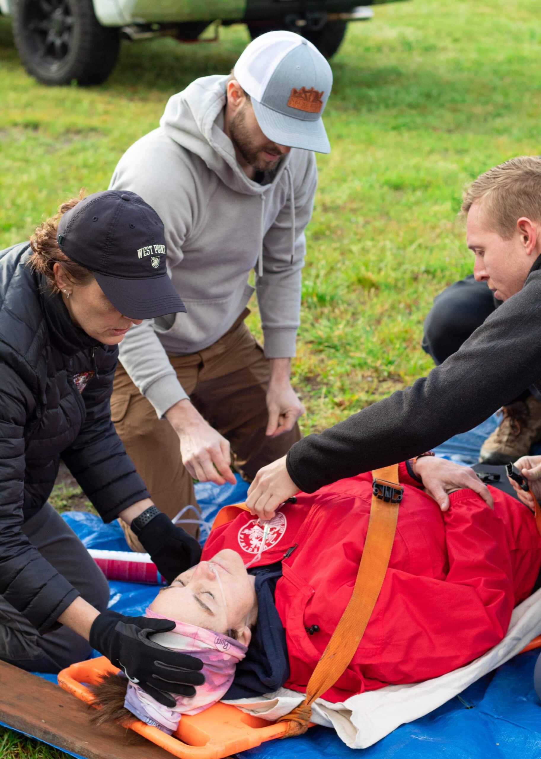 ECUH Wilderness Day 3 ECU Health emergency medicine residents treat a patient during an exercise at Wildwood Park in Greenville.