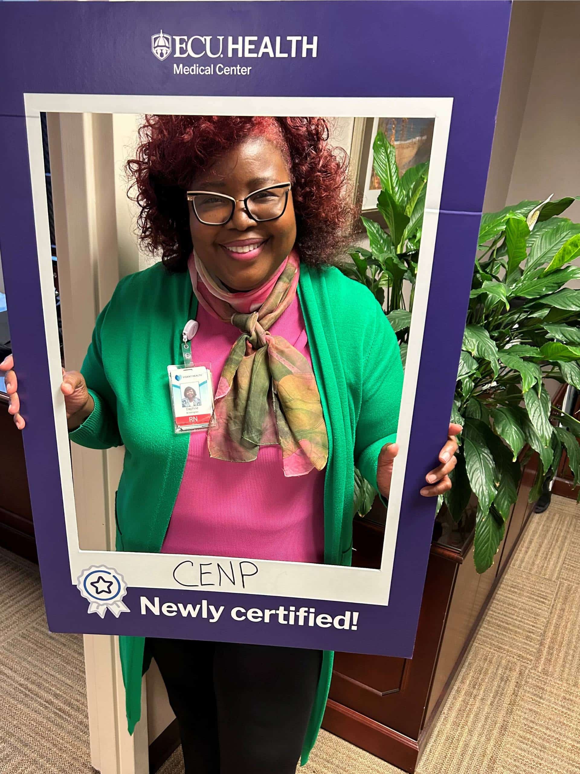 Dr. Brewington, Senior Vice President of ECU Health medical center poses as she receives her specialty certification