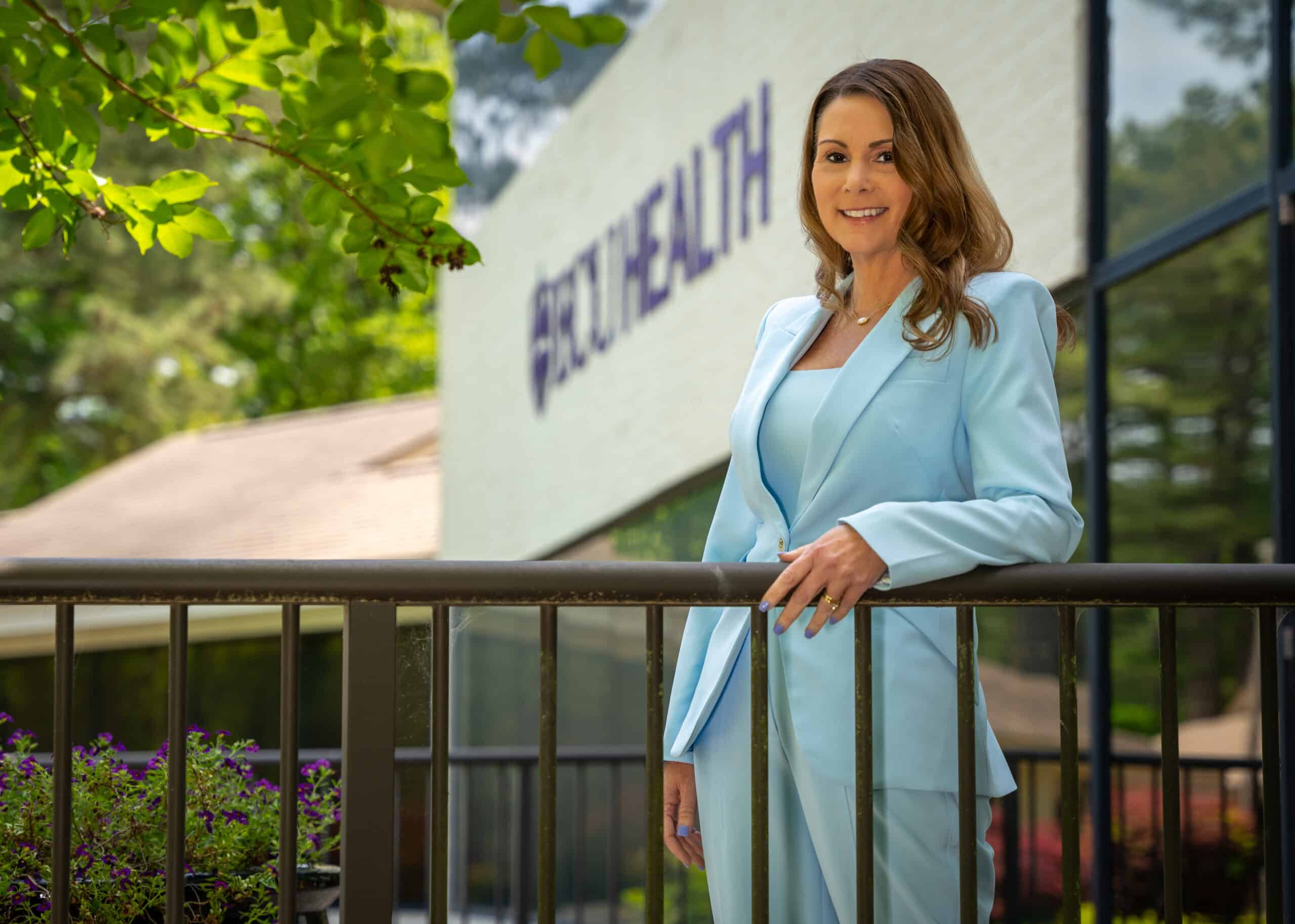 ECU Health Chief Nursing Executive Trish Baise poses for a photo outside of the ECU Health Administration Building.