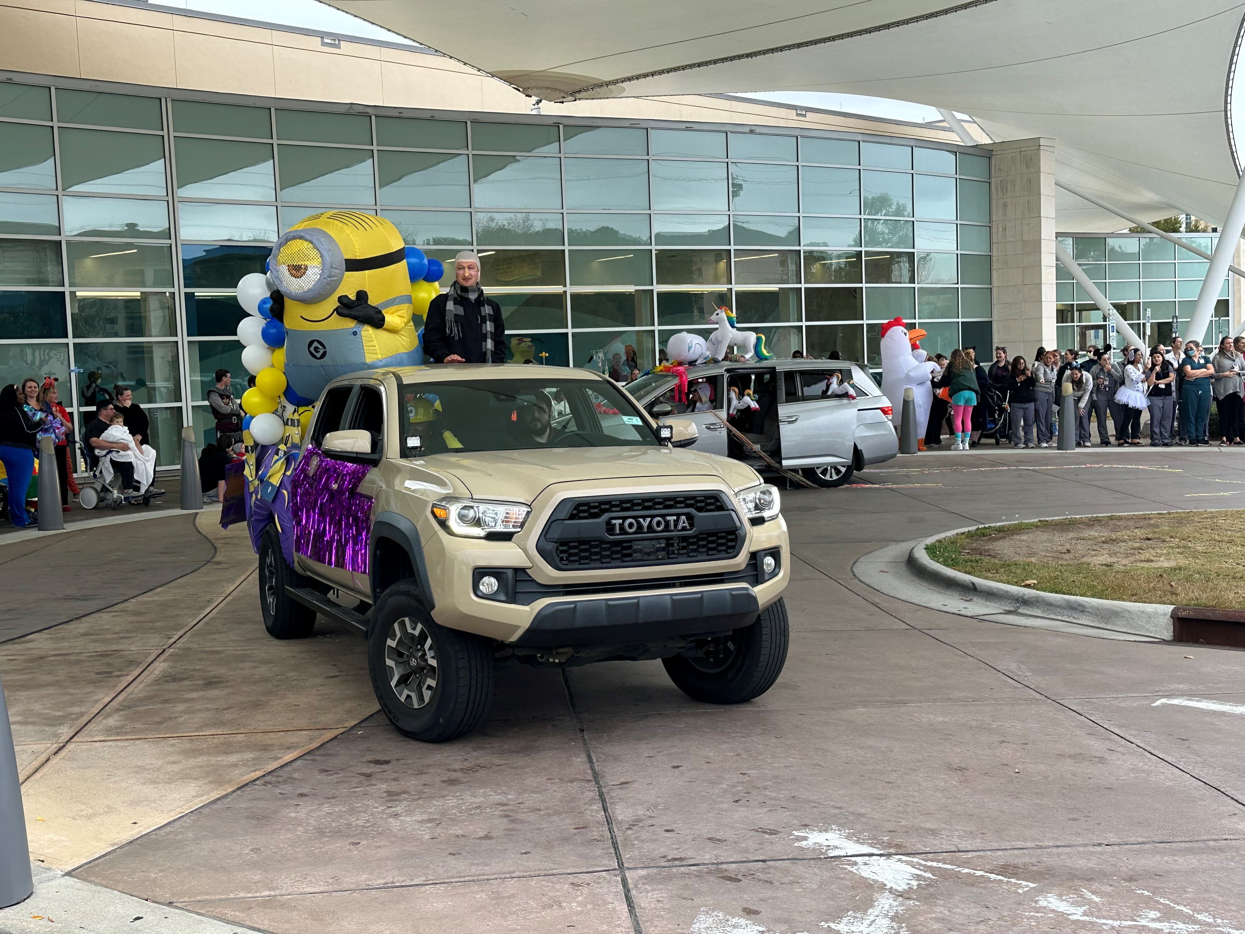 The Minions float rides by during the Maynard Children's Hospital Halloween parade.