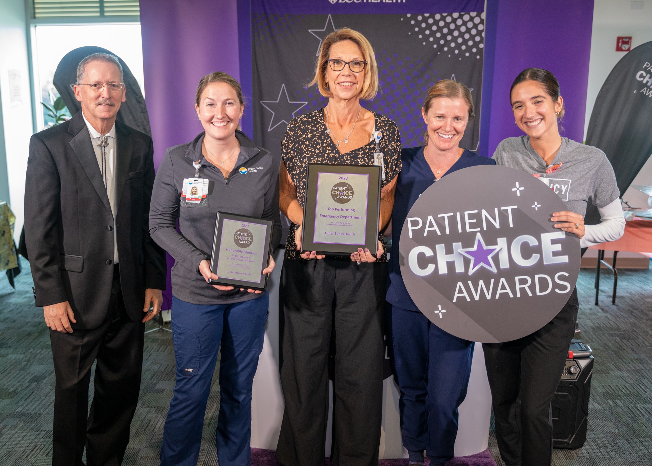 The Outer Banks Health Emergency Department team gathers together for a group photo to celebrate a pair of Patient Choice Awards.