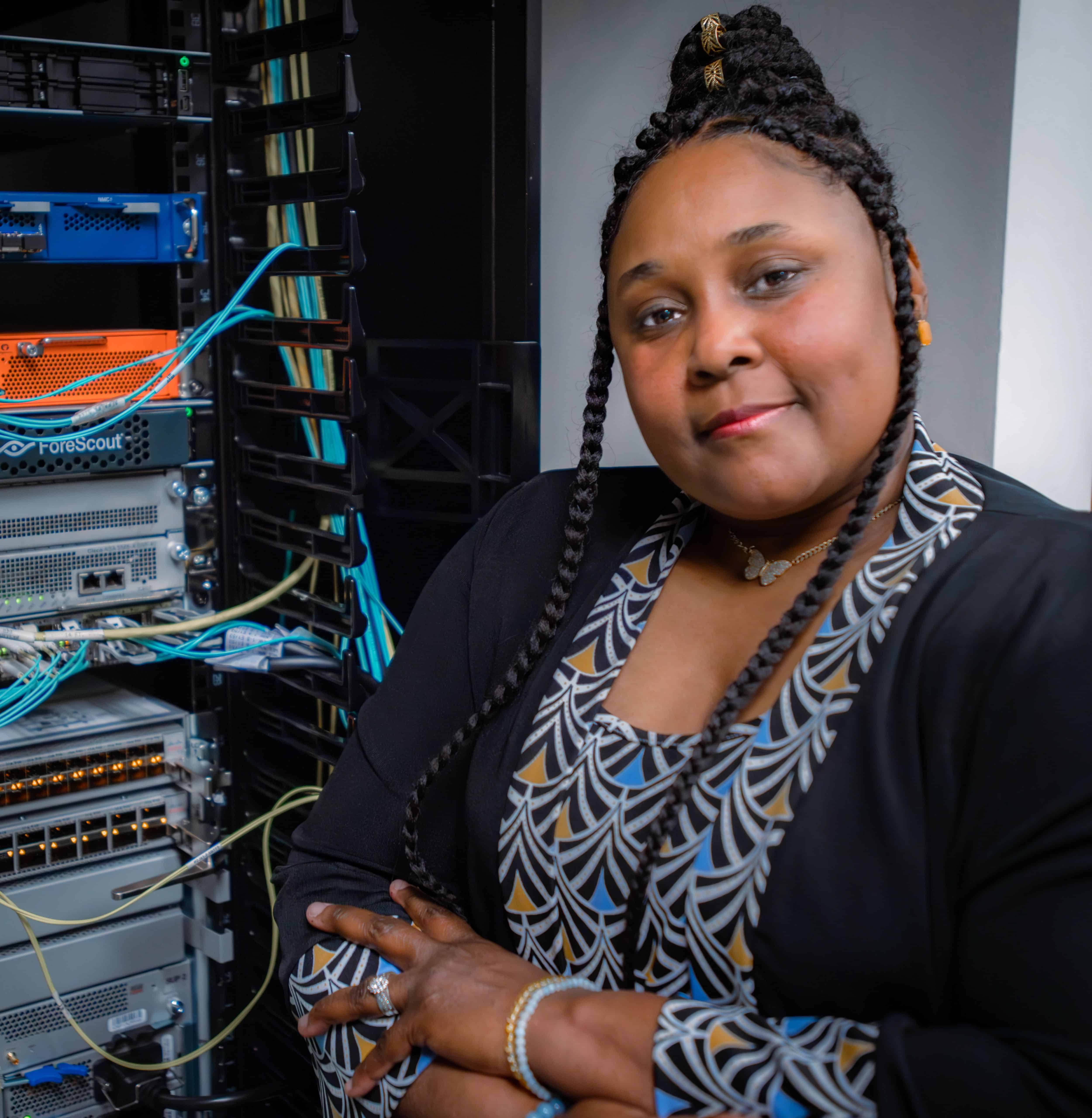 Nichole Snead, a member of the Identity Access Management department, poses in her office space at ECU Health.
