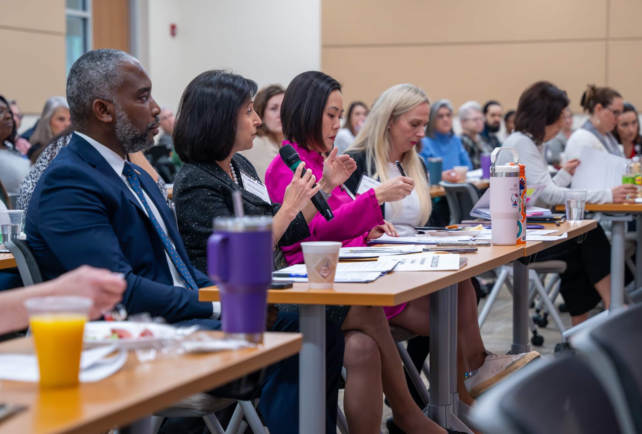 ECU and ECU Health leaders ask questions of presenters during the Quality Improvement Symposium.