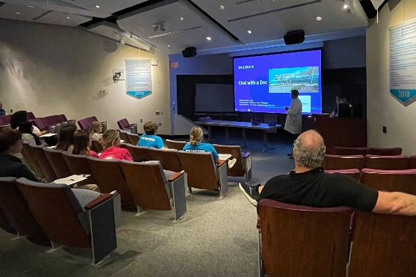 Dr. Matthew Ledoux speaks to students during a Chat with a Doc event through Health Sciences Academy at ECU Health Medical Center.