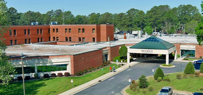ECUH-RoanokeChowan-PRIMARY-858x402 The main entrance of ECU Health Roanoke-Chowan Hospital is shown from an aerial view.