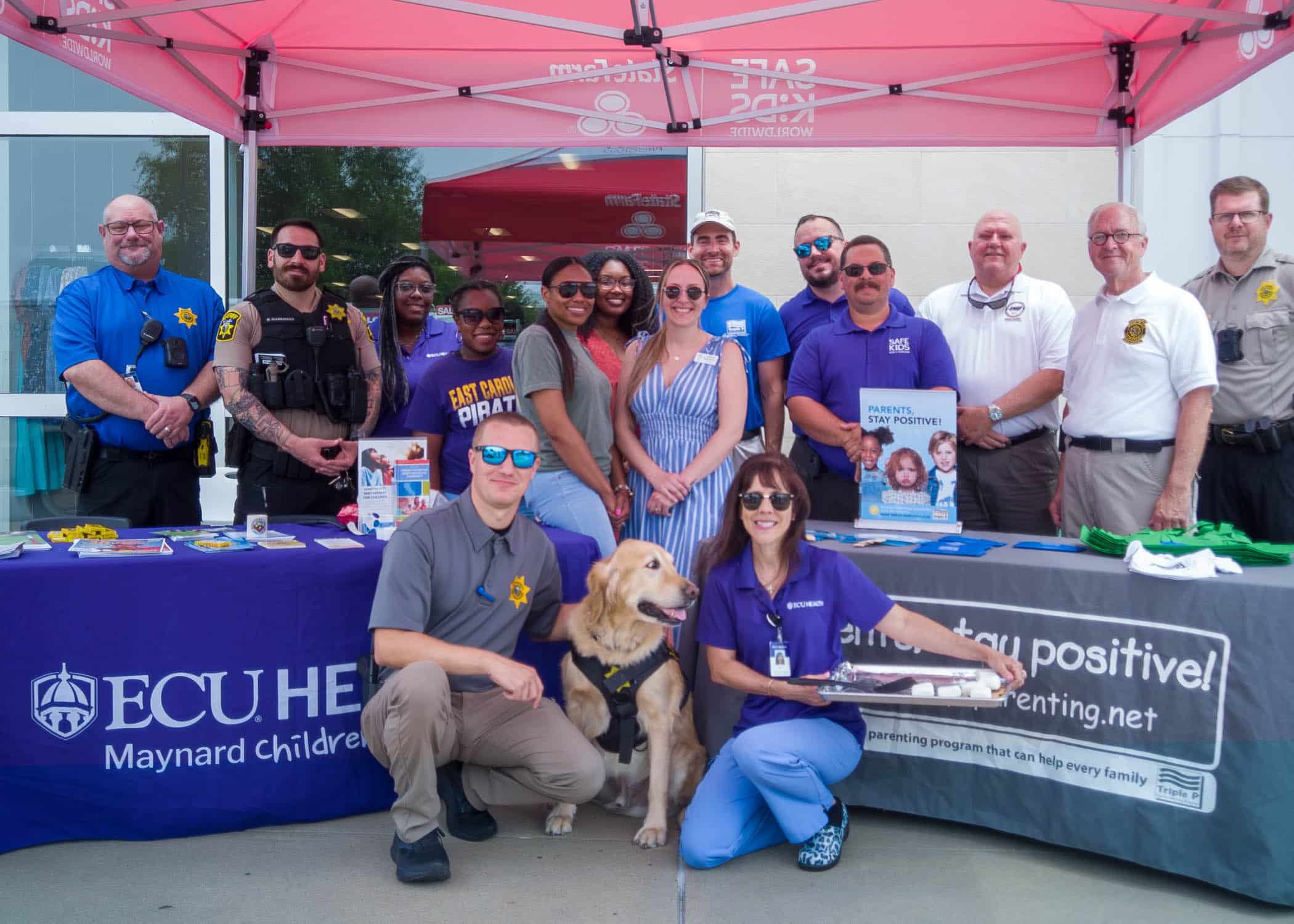 HotCarEvent2024-0934 A group of ECU Health team members, first responders and local partners gather together for a photo during a Hot Car Safety event in Greenville.