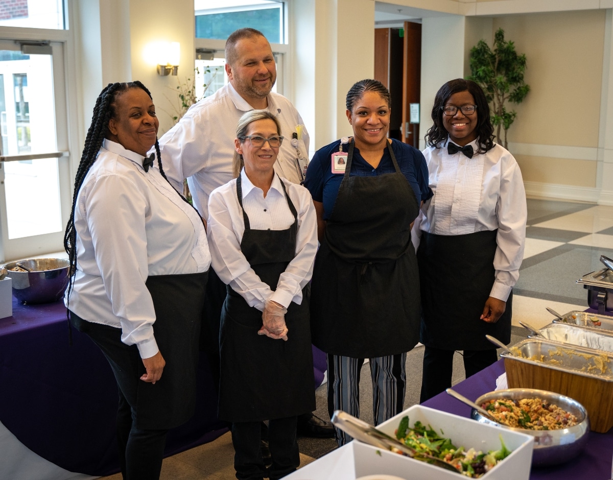 BlueZoneLuncheon-3895 Members of the Food and Nutrition team pose for a photo during a Blue Zone Luncheon at the East Carolina Heart Institute at East Carolina University.