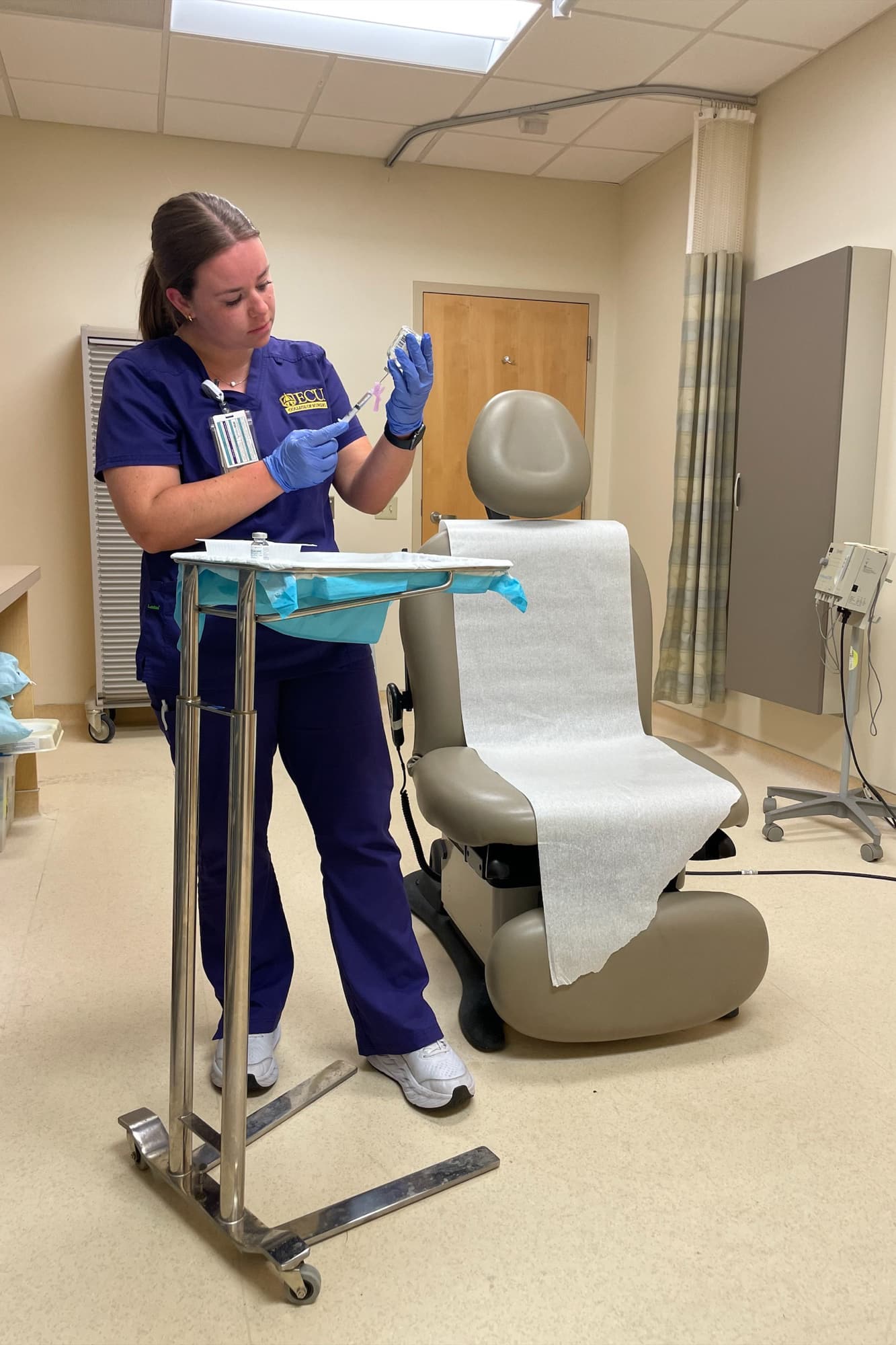 Nurse extern Emma Campbell Emma Campbell, a College of Nursing student nurse extern, prepares the ambulatory clinic at ECU Health Medical Center for a patient.