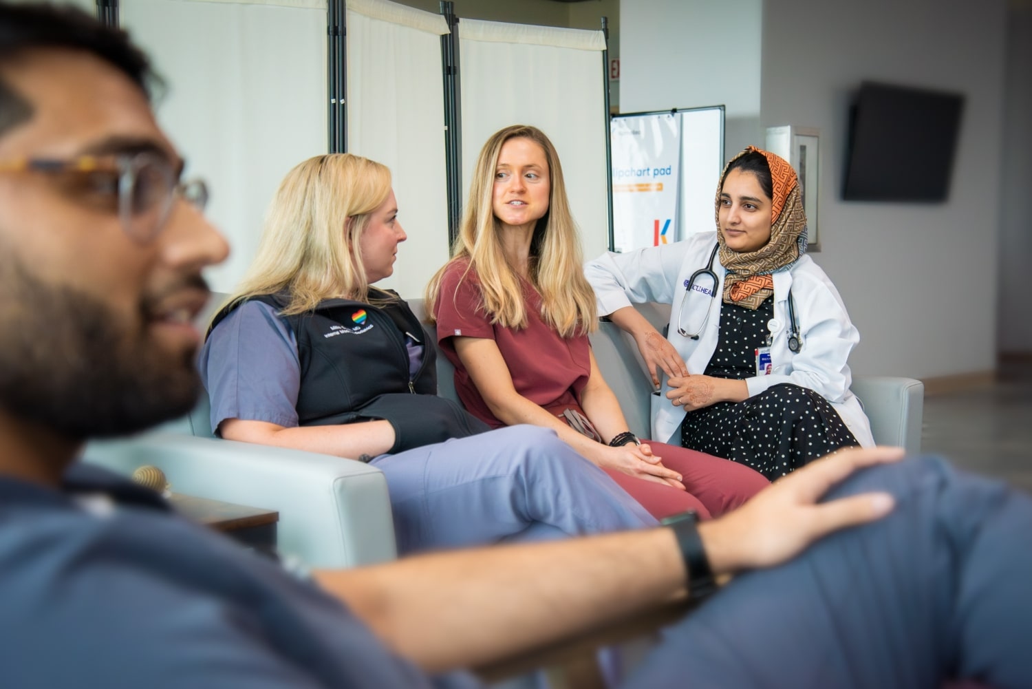 Well-beingLounge-9042 ECU Health residents take a moment to gather together in the Resident Well-Being Zone.