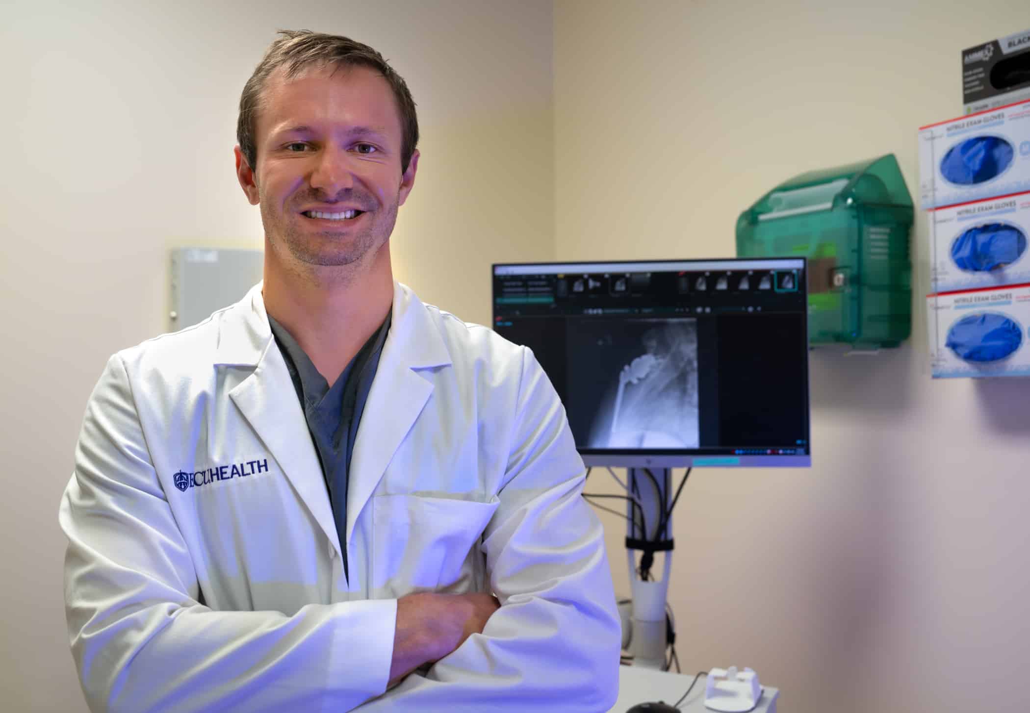Dr. Shawn Yeazell poses for a photo in his clinic.