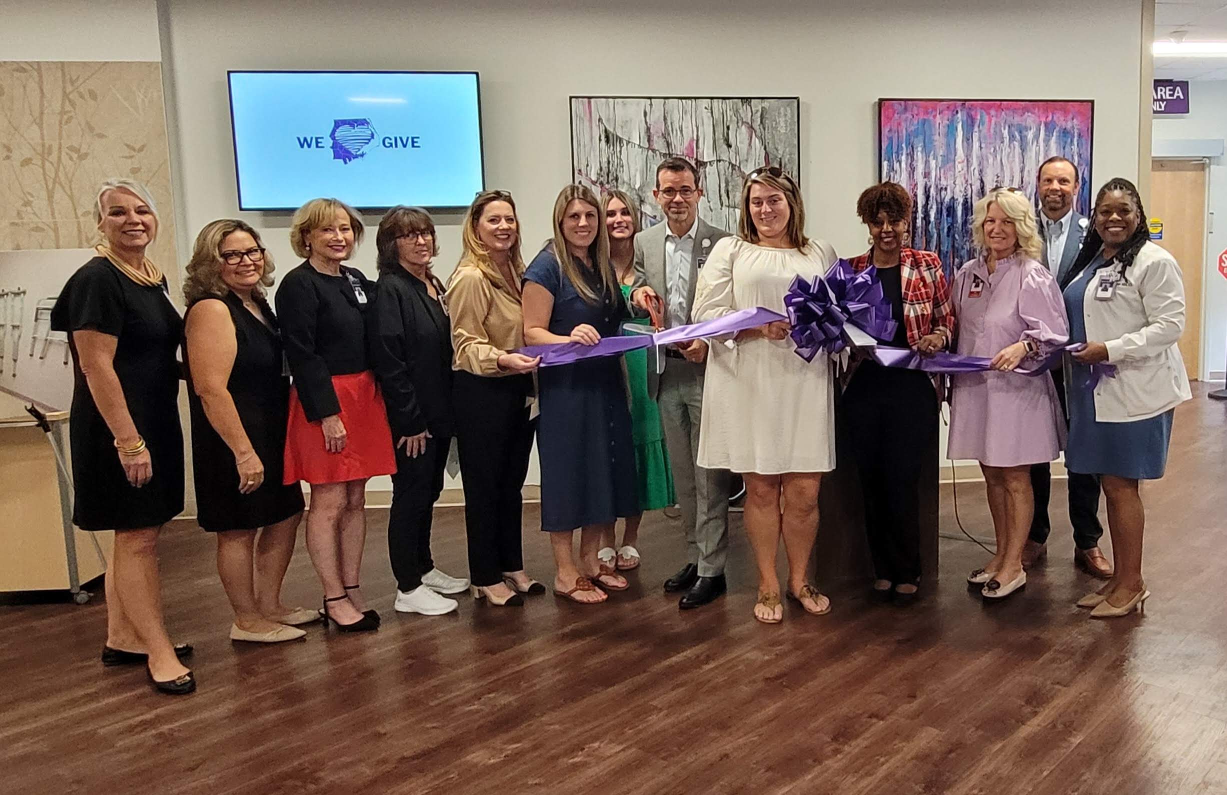 ECU Health team members gather at ECU Health North Hospital for a ribbon cutting and dedication ceremony for a new CNA Program launched in 2025.