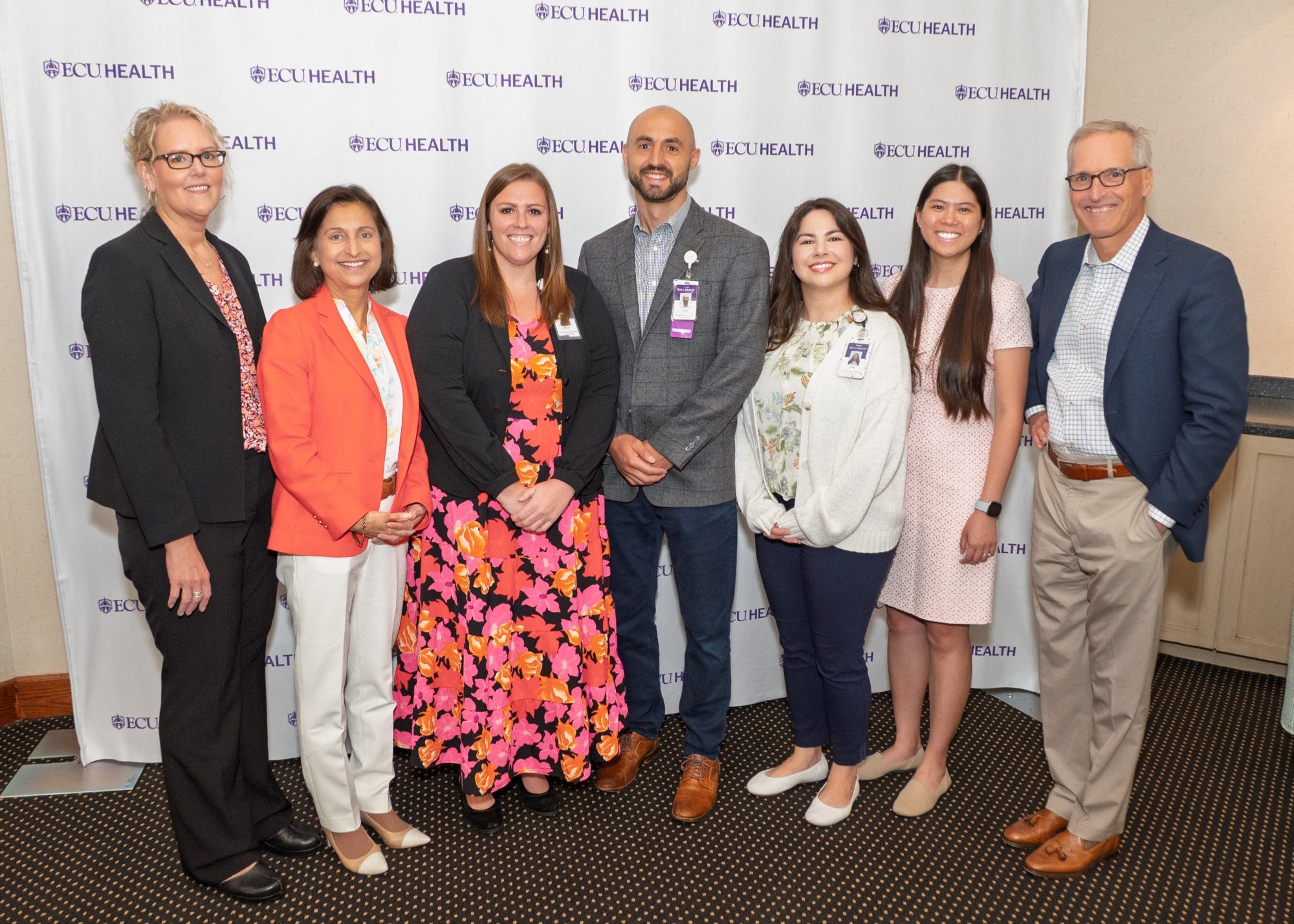 From left to right, Dr. Teresa Anderson, Senior Vice President of Quality at ECU Health Medical Center, Dr. Niti Armistead, Chief Clinical Officer and Chief Quality Officer, ECU Health, Nicole Nicolsen, PharmD, BCPS, BCIDP, ASP/Infectious Diseases pharmacist manager, David Laurent, PharmD, VCPS, BCIDP, ASP/ID pharmacist, Emily Perez, PharmD, ASP/ID pharmacist, Melissa George, PharmD, BCIDP, ADP/ID pharmacist, and Dr. Michael Waldrum, dean of the Brody School of Medicine at East Carolina University and CEO of ECU Health.