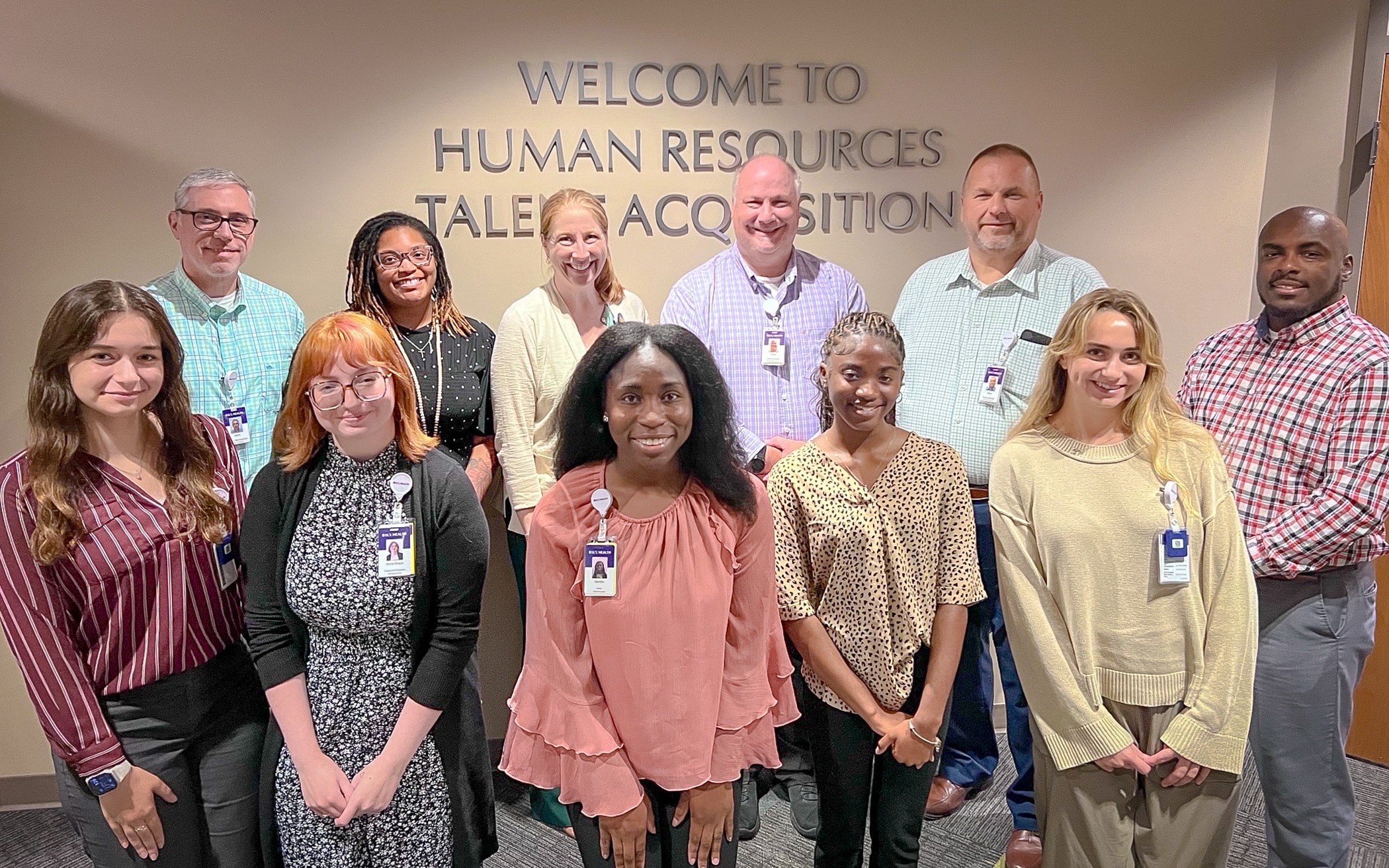non-clinical internship edit Non-clinical summer interns pose for a photo with program facilitators.