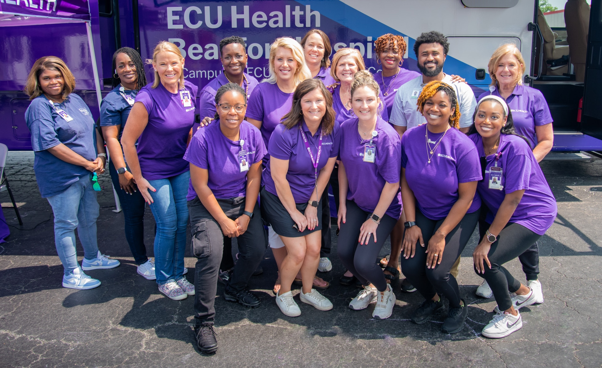 CommHealthEvent-Jamesville-4832 (1) ECU Health team members pose for a photo during a community event.